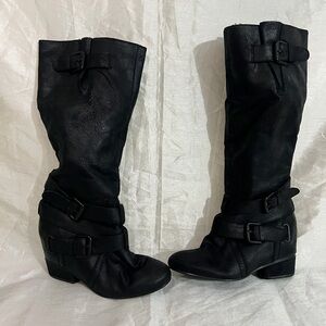 Women's Black Knee-High Boots Size
7 Synthetic Leather Zip Up